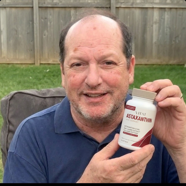 VITA1 community member holding their bottle