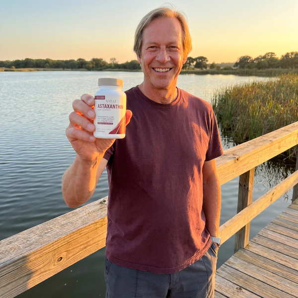 VITA1 community member holding their bottle
